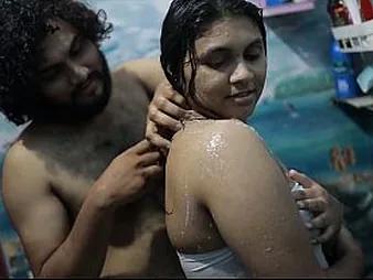 Desi Bhabhi likes getting muggy in a crimson-scorching douche give a youthful boy